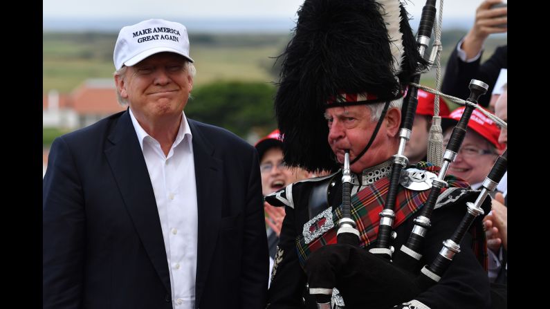 A man plays the bagpipes next to presidential candidate Donald Trump after Trump arrived at his Turnberry golf resort in Scotland on Friday, June 24. The GOP's presumptive nominee <a href="http://www.cnn.com/2016/06/23/golf/donald-trump-turnberry-golf-course-scotland/" target="_blank">has spent more than $280 million,</a> he said, to restore and upgrade the resort.