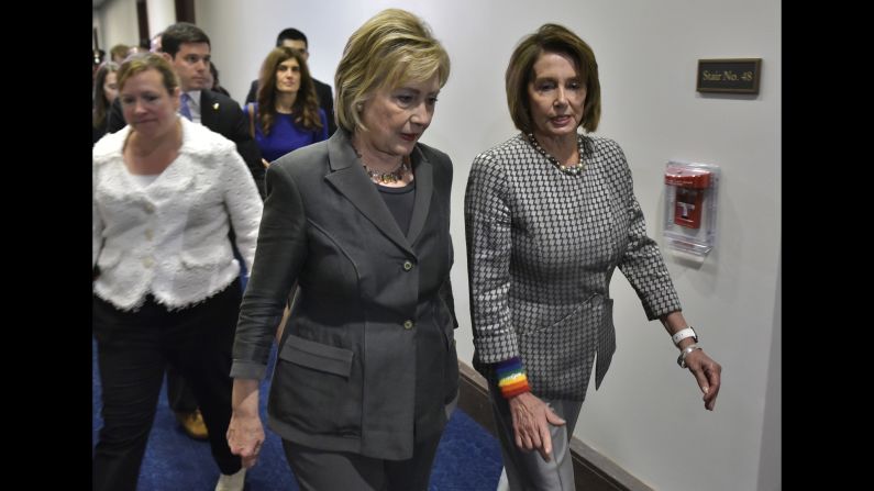 House Minority Leader Nancy Pelosi, right, walks with Democratic presidential candidate Hillary Clinton after a meeting in Washington on Wednesday, June 22.