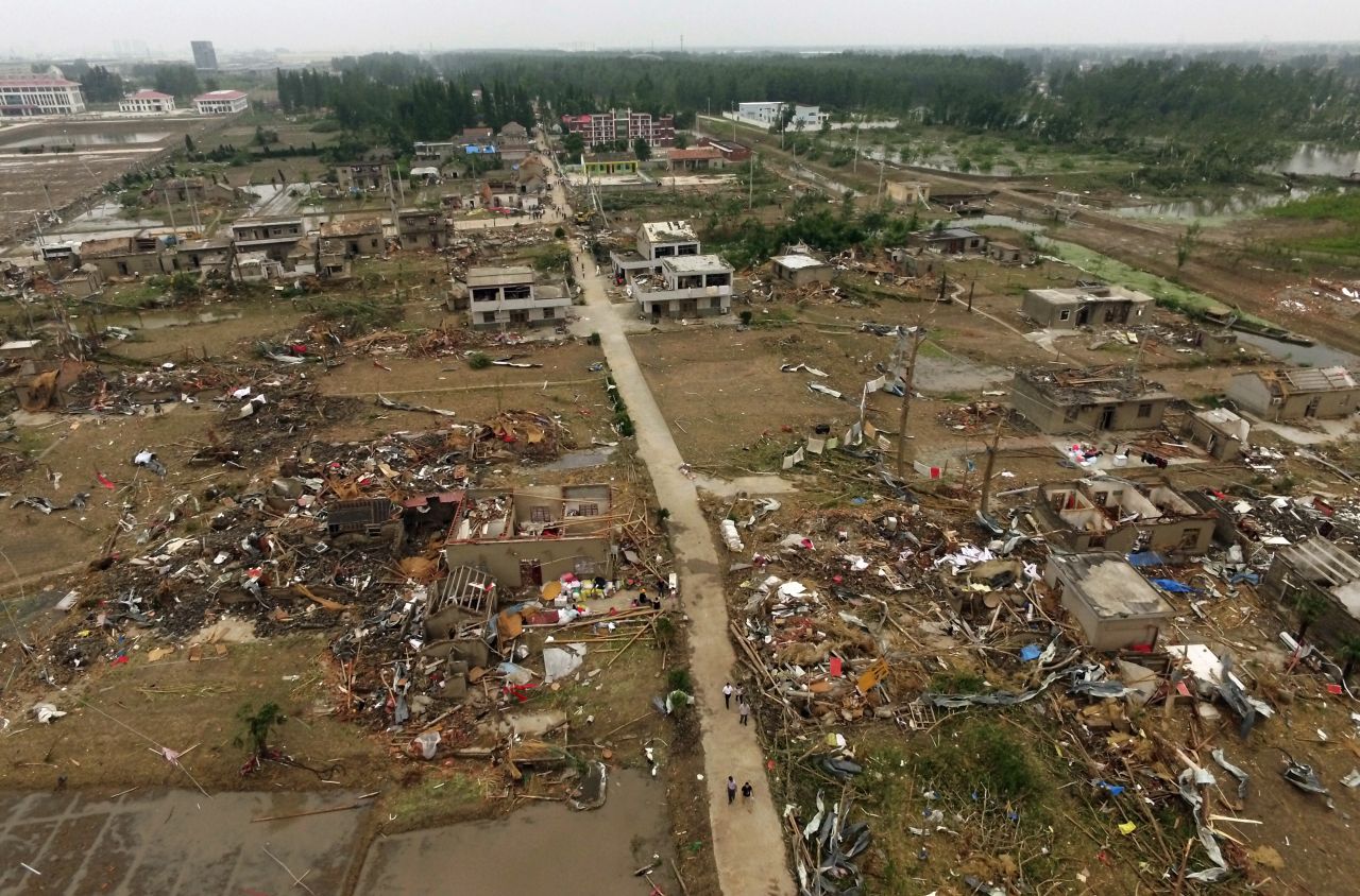 The extent of storm damage is seen across the village of Funing, near Yancheng City in China's Jiangsu Province, on Friday, June 24. Severe weather, including a rare tornado, struck the region on June 23, killing at least 98 people and injuring hundreds.