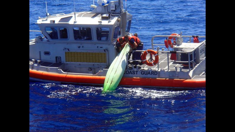 Members of the U.S. Coast Guard recover a kayak off the coast of Sanibel, Florida, on Wednesday, June 22. The kayak was believed to belong to a man and his three teenage children who recently went missing while sailing. The bodies of Ace Kimberly, 45, and his daughter Becky, 17, were recovered. Kimberly's sons Roger and Donny were still missing when <a href="index.php?page=&url=http%3A%2F%2Fwww.cnn.com%2F2016%2F06%2F25%2Fus%2Fmissing-florida-family%2F" target="_blank">search operations were called off.</a>