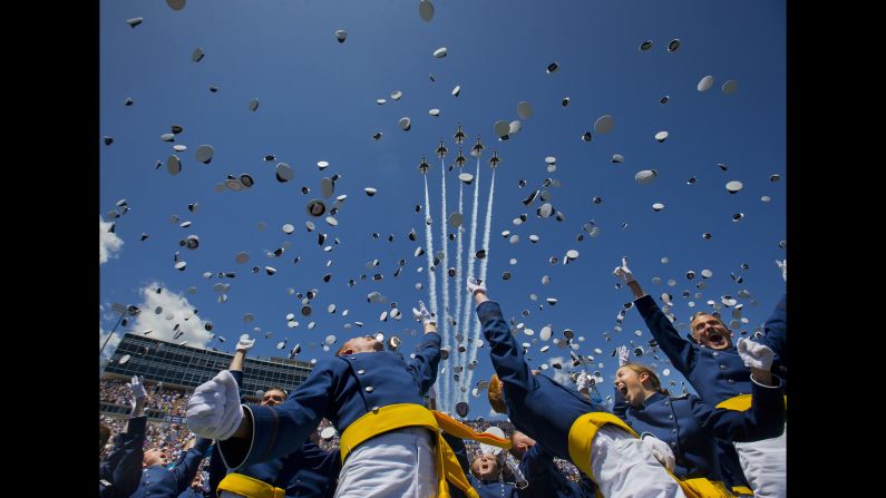 The U.S. Air Force Thunderbirds fly overhead as cadets graduate from the U.S. Air Force Academy on Thursday, June 2. <a href="index.php?page=&url=http%3A%2F%2Fwww.cnn.com%2F2016%2F06%2F02%2Fpolitics%2Fmilitary-plane-crash%2F" target="_blank">One of the Thunderbirds crashed</a> shortly after the flyover.
