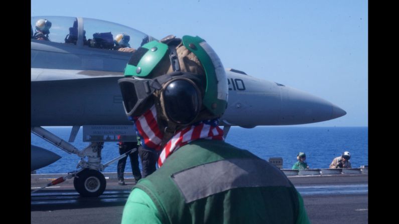U.S. Navy sailors prepare to launch a fighter jet from the deck of the USS Harry S. Truman on Tuesday, June 7. The aircraft carrier was in the Mediterranean Sea to assist in the fight against the ISIS militant group.