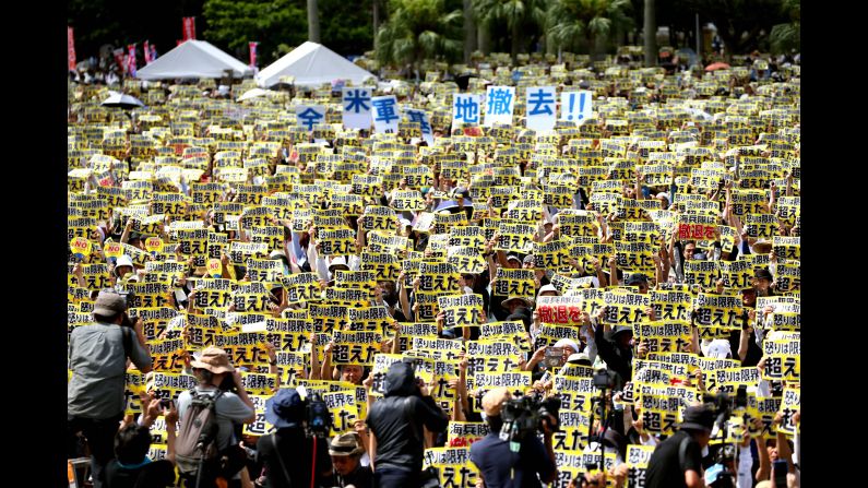 People hold signs that say "anger going beyond limits" during a demonstration in Naha, Japan, on Sunday, June 19. Tens of thousands of people have demanded an end to the United States' military presence on the Japanese island of Okinawa <a href="index.php?page=&url=http%3A%2F%2Fwww.cnn.com%2F2016%2F06%2F20%2Fasia%2Fus-military-base-protests-okinawa%2F" target="_blank">following the killing of a local woman.</a> Kenneth Franklin Shinzato, a 32-year-old civilian worker who was stationed at the U.S. Kadena Air Base, was arrested on suspicion of murdering the woman.