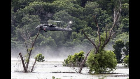 Army helicopters hover above Belton Lake on Friday, June 3, as they look for missing soldiers who were swept away by floodwaters in Texas. <a href="http://www.cnn.com/2016/06/03/us/texas-floods/" target="_blank">Nine soldiers from Fort Hood were killed</a> when their vehicle overturned during a training mission.