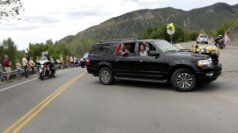 Family members of U.S. Marine Capt. Jeff Kuss thank people on the way to his funeral in Durango, Colorado, on Saturday, June 11. Kuss, a pilot with the Blue Angels demonstration team, <a href="http://www.cnn.com/2016/06/03/politics/blue-angels-pilot-identified/" target="_blank">died when his plane crashed during practice</a> in Tennessee. He was 32.