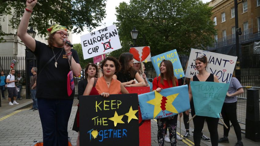 A small group of Anti-Brexit protesters protest opposite Downing Street in central London following the UK's decision to leave the EU, in central London on June 24, 2016.
Britain has voted to break out of the European Union, striking a thunderous blow against the bloc and spreading panic through world markets Friday as sterling collapsed to a 31-year low. The pound plunged and world stock markets descended into pandemonium Friday after Britain's shock vote to leave the European Union, fuelling a wave of global uncertainty. / AFP / GEOFF CADDICK        (Photo credit should read GEOFF CADDICK/AFP/Getty Images)