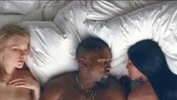 In Kanye West's new video for "Famous," he appears in bed with likenesses of several celebrities, including Taylor Swift, left, and Kim Kardashian, West's wife.