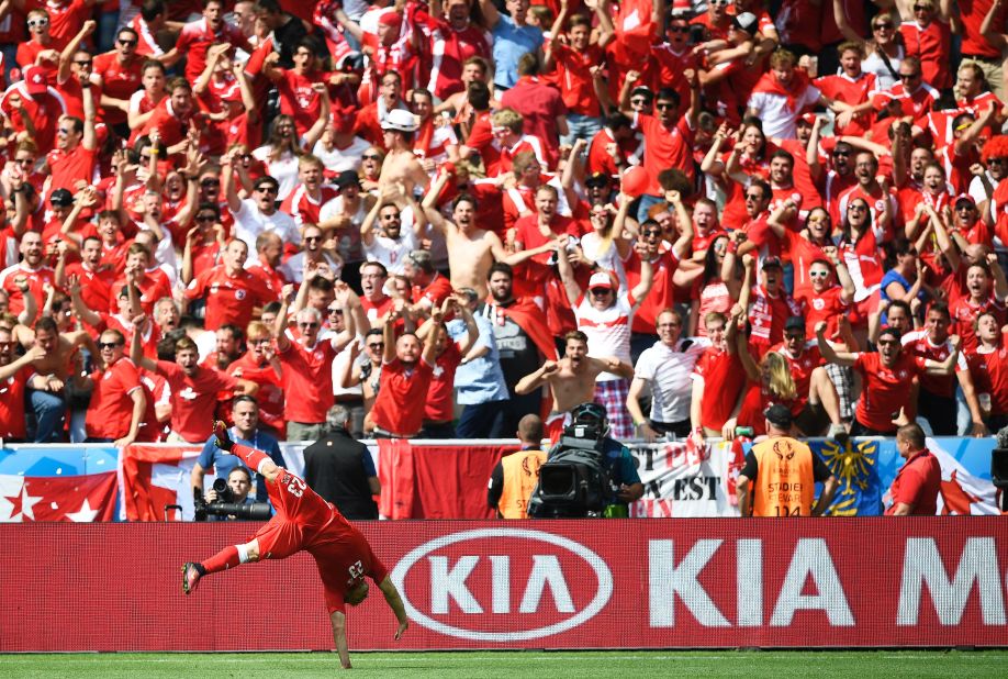Switzerland midfielder Xherdan Shaqiri celebrates after scoring his team's stunning equalizer.