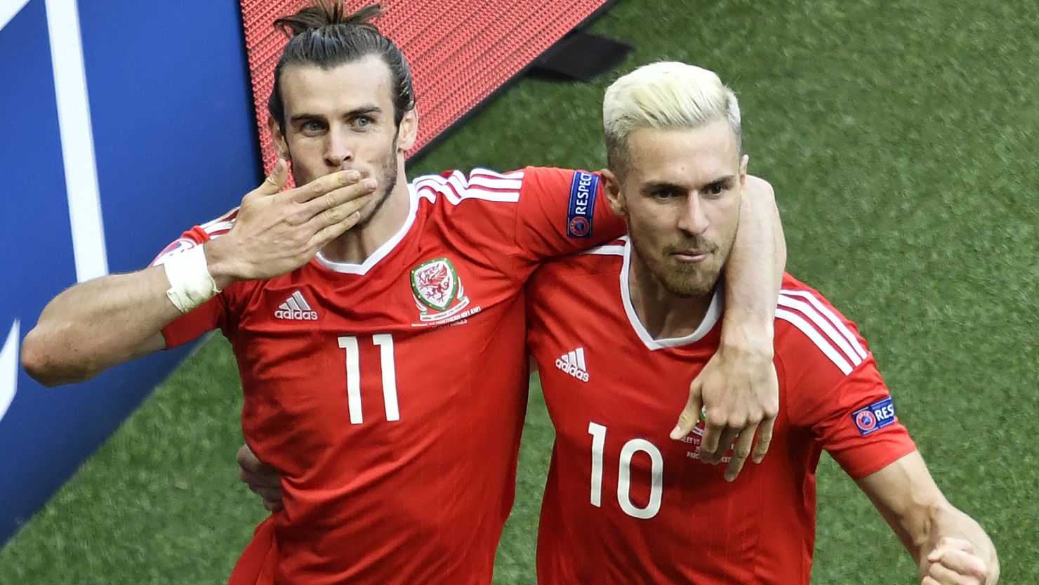 Gareth Bale (left) and midfielder Aaron Ramsey celebrate after an own goal by Northern Ireland's defender Gareth McAuley put their side ahead at the Parc des Princes.