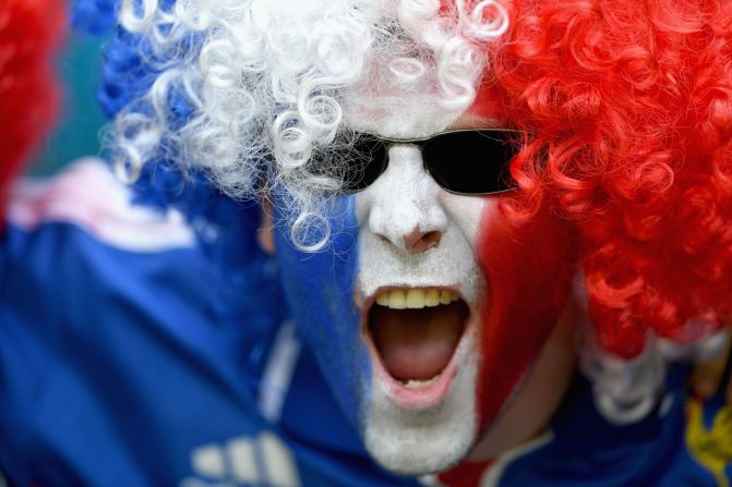  A France fan cheers his team. 