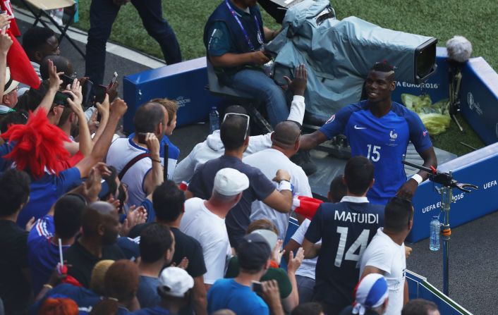 Paul Pogba of France celebrates his team's 2-1 win over Republic of Ireland with supporters at Stade des Lumieres on Sunday, June 26,  in Lyon, France. 