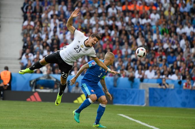 Mario Gomez of Germany is fouled by Martin Skrtel of Slovakia, resuting in a penalty kick.