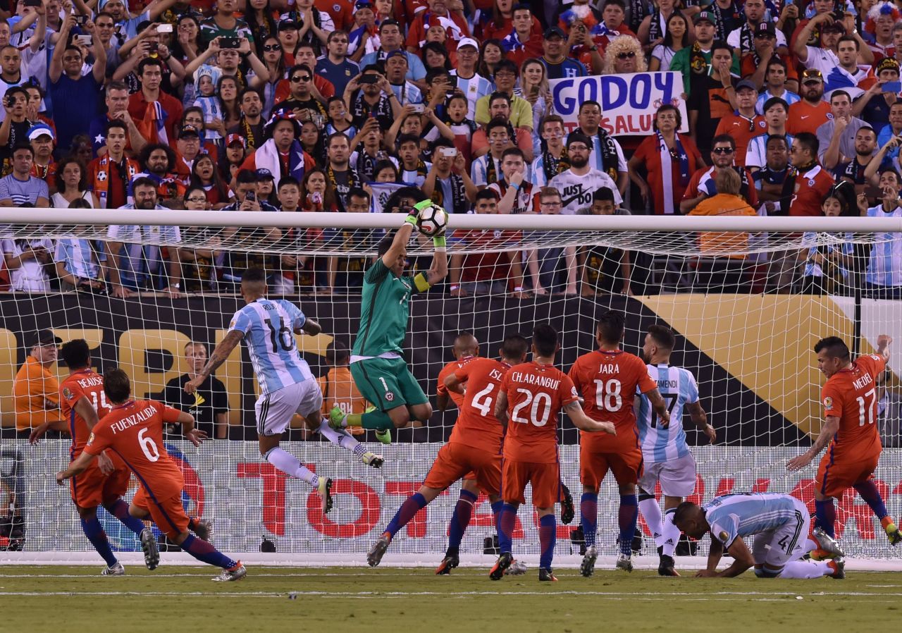Chile's goalkeeper Claudio Bravo catches the ball.