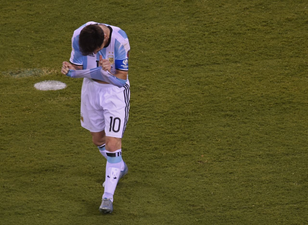 Argentina's Lionel Messi gestures after missing his shot during the penalty shoot-out.