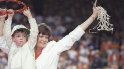 30 Mar 1997: Coach Pat Summitt of the Tennessee Volunteers cuts with net with help of her son Tyler after a playoff game against the Old Dominion Monarchsat Riverfront Coliseum in Cincinnati, Ohio. The Volunteers won the game 68 - 59.