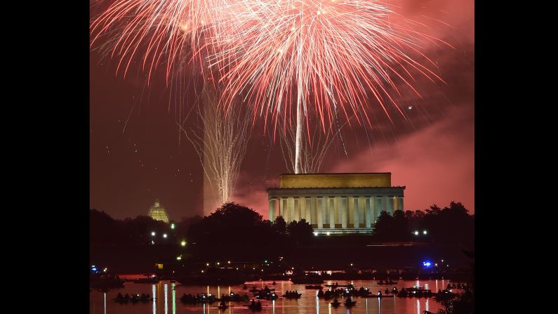 Fireworks explode over the Washington Monument, the U.S. Capitol and the Lincoln Memorial in celebration of Independence Day, July 4, in Washington, D.C.