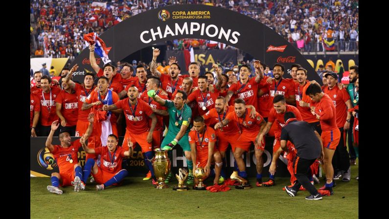 Chile poses with the championship trophy after winning the Copa America Centenario. Chile also defeated Argentina on penalties in last year's tournament.