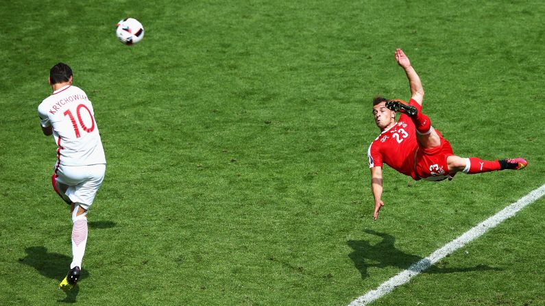 Switzerland's Xherdan Shaqiri scores an outrageous bicycle kick against Poland on Saturday, June 25. Poland, however, would go on to win the match on penalties and advance to the quarterfinals of Euro 2016.