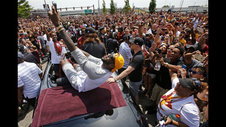 LeBron James takes a selfie during the Cleveland Cavaliers' victory parade on Wednesday, June 22. The Cavaliers <a href="index.php?page=&url=http%3A%2F%2Fwww.cnn.com%2F2016%2F06%2F19%2Fsport%2Fgallery%2Fnba-finals-game-7%2Findex.html" target="_blank">won their first NBA title</a>, ending the city of Cleveland's long championship drought. <a href="index.php?page=&url=http%3A%2F%2Fwww.cnn.com%2F2016%2F06%2F20%2Fsport%2Fgallery%2Fcities-longest-championship-droughts%2Findex.html" target="_blank">See other cities' droughts</a>