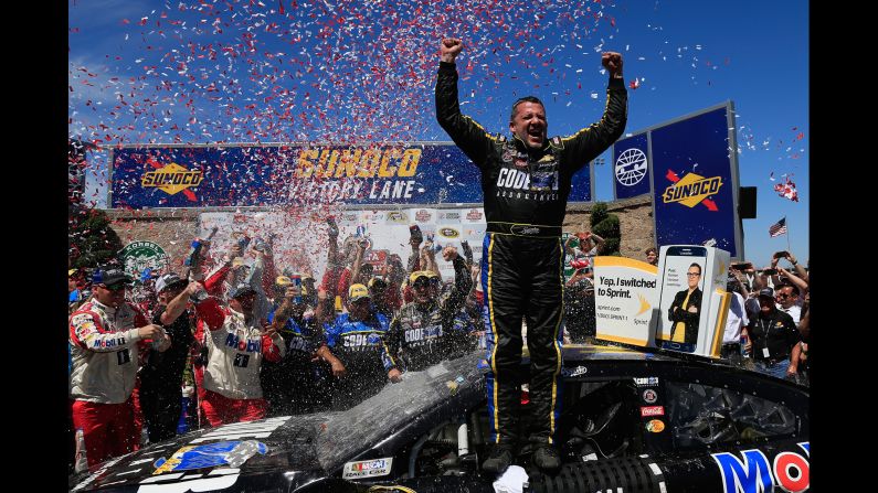 NASCAR driver Tony Stewart celebrates after winning the Sprint Cup race in Sonoma, California, on Sunday, June 26.