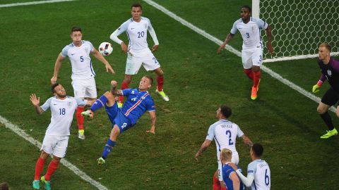 Iceland's Ragnar Sigurdsson attempts an overhead kick in the English box. His goal in the sixth minute tied the match at 1-1.
