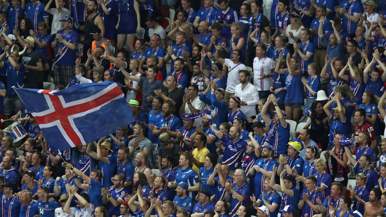 Iceland supporters cheer on their team at the stadium in Nice, France.
