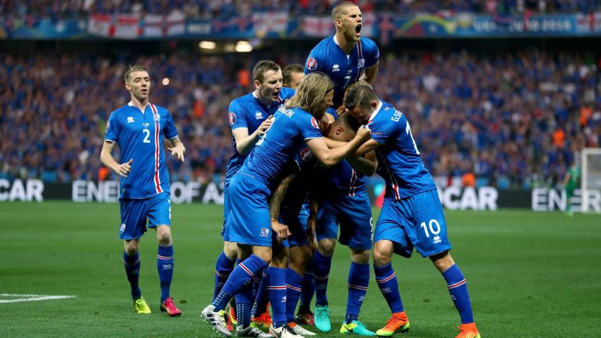NICE, FRANCE - JUNE 27:  Ragnar Sigurdsson (C, obscured) of Iceland celebrates scoring his team's first goal with his team mates during the UEFA EURO 2016 round of 16 match between England and Iceland at Allianz Riviera Stadium on June 27, 2016 in Nice, France.  (Photo by Lars Baron/Getty Images)