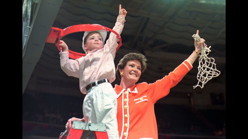 FILE - In this March 31, 1996, file photo, Tennessee coach Pat Summitt and son Tyler, 5, take down the net after winning the NCAA Women's Final Four championship basketball game against Georgia 83-65 at the Charlotte Coliseum in Charlotte, N.C. Tyler now works with the Tennessee Lady Vols as a practice player and has ambitions of following his mom into coaching. (AP Photo/Pat Sullivan, File)
