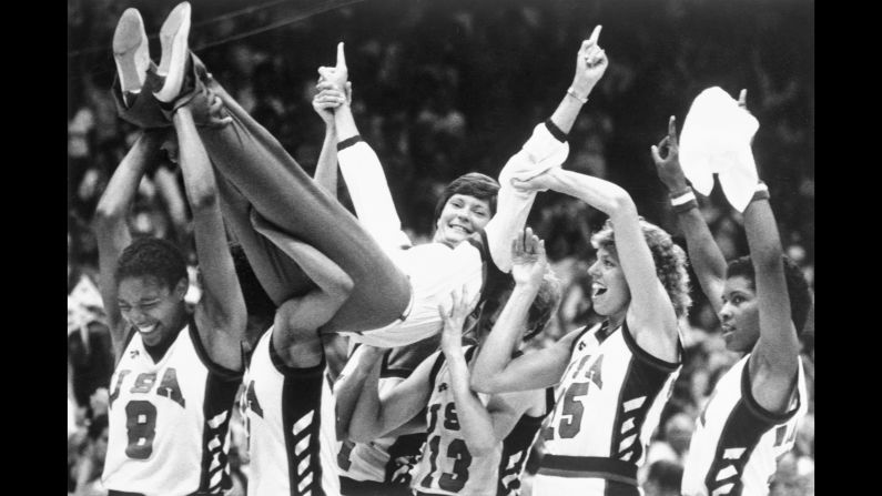 Coach Pat Summitt is carried off the floor by her players after the USA won the gold medal in basketball against Korea in the 1984 Olympics.