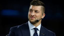 Tim Tebow of the SEC Network speaks on air before the Goodyear Cotton Bowl on December 31, 2015, in Arlington, Texas.