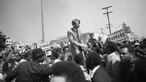 Presidential candidate Robert F. Kennedy campaigns in the Watts neighborhood of Los Angeles in 1968. Kennerly said it was "a brave act by a white politician to appear in the predominantly African-American section of town that so recently had been torn apart by riots after the assassination of Martin Luther King. But that was the Kennedy strength and family philosophy on display. A few weeks later, like MLK, he would also be struck dead by an assassin's bullet."
