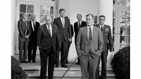 In 1991, President Bush briefs the press in the White House Rose Garden about a possible war with Iraq. "If you ever thought that people in power don't stick around Washington forever, this scene will relieve any doubt," Kennerly said. Behind Bush, from left, are National Security Advisor Brent Scowcroft, CIA Director Robert Gates, Defense Secretary Dick Cheney, Vice President Dan Quayle and Secretary of State Jim Baker. At far right is Gen. Colin Powell, who was chairman of the Joint Chiefs of Staff.