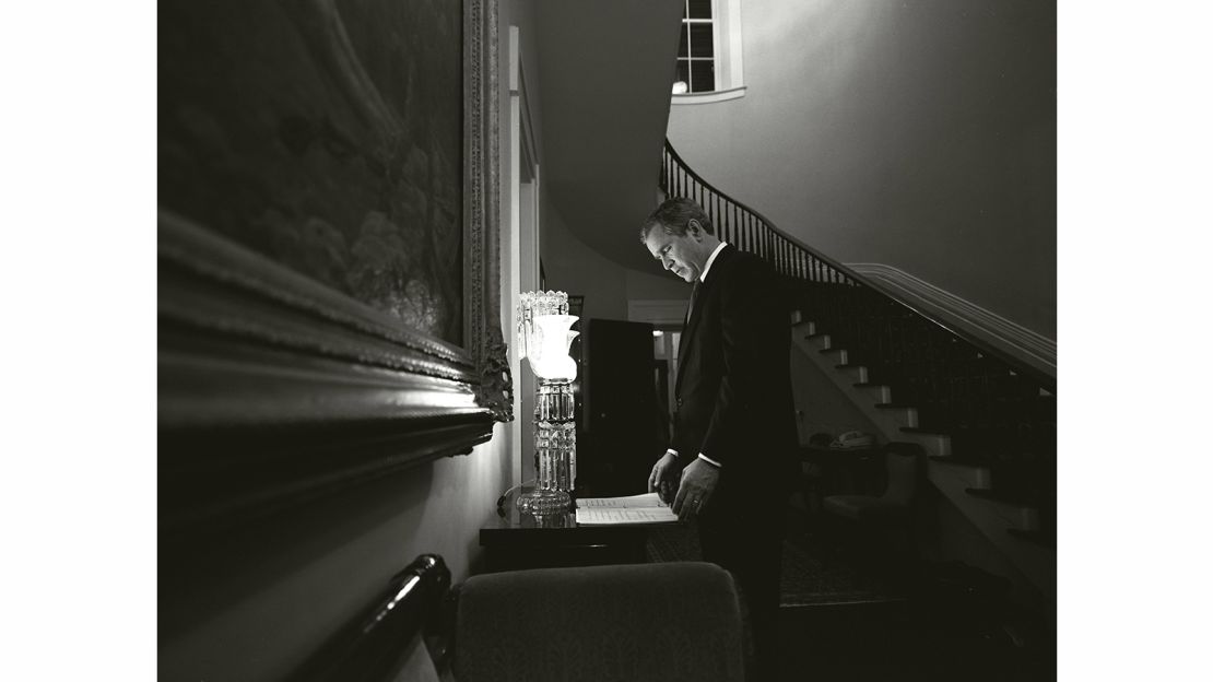 Presidential candidate George W. Bush reads over the victory speech he thinks he's going to deliver in 2000. The evening ended in disarray, with Al Gore rescinding his concession after Florida swung from a Bush victory back to "too close to call." 