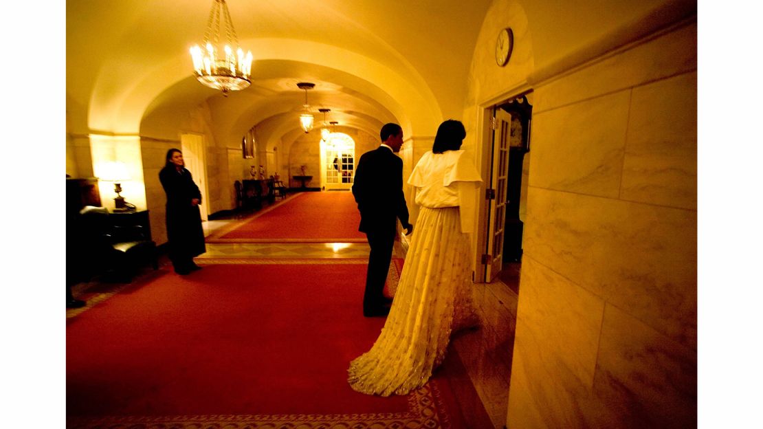 President Barack Obama and first lady Michelle Obama return to the White House late after attending an inaugural ball in 2009.