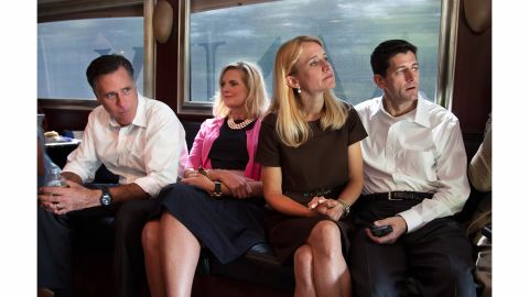 Republican presidential candidate Mitt Romney, left, and his running mate, Paul Ryan, ride a campaign bus with their wives Ann and Janna in 2012.