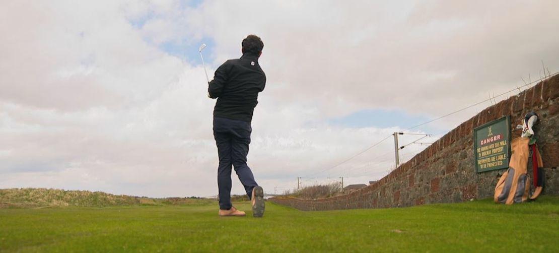 The first hole at Prestwick Golf Club is overlooked by an active railway.