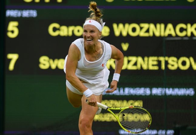 The Dane lost 7-5 6-4 on Centre Court to Russian 13th seed Svetlana Kuznetsova, who next faces Tara Moore. The Hong Kong-born Brit is in the second round of a grand slam for the first time after beating Belgium's Alison van Uytvanck 6-3 6-2. 