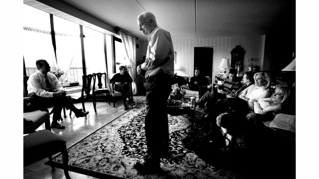 Sen. John McCain meets with his advisers in a New Hampshire hotel room during the 2008 presidential campaign.