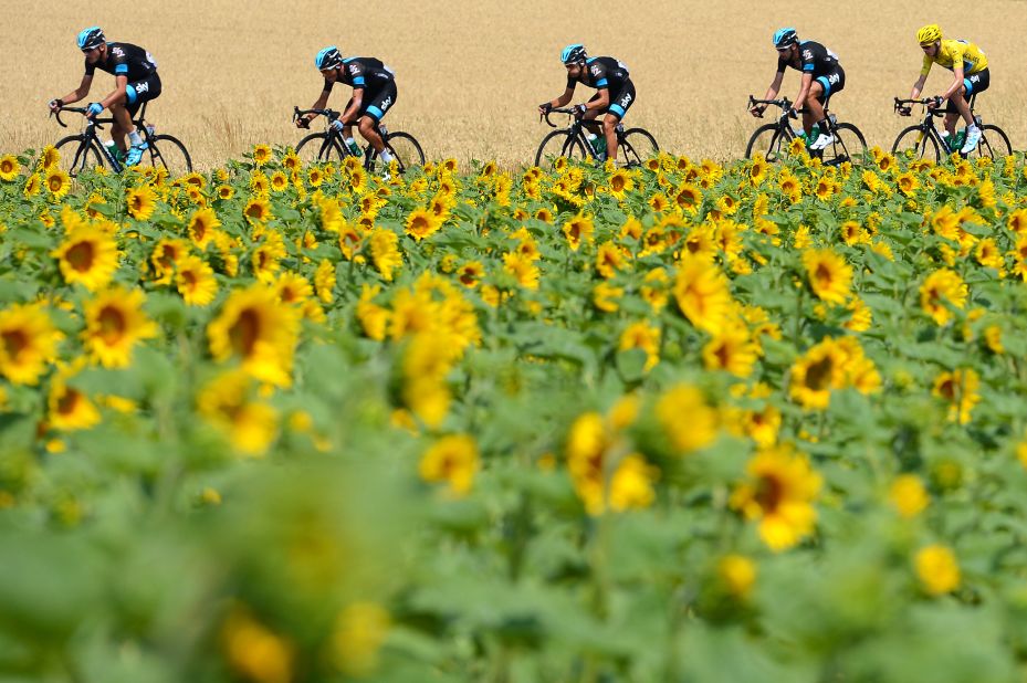 The favorite to win the 2016 race is Team Sky's Chris Froome, who is pictured at the back.