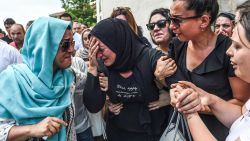 The daughter (center) of Siddik Turgan, a man who was killed in the June 28 attack on Istanbul Ataturk Airport, reacts during his funeral ceremony on June 29 in Istanbul. Turkey declared June 29 a day of national mourning over the deadly attacks.