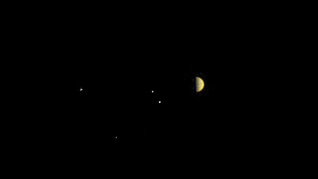 Jupiter and the gaseous planet's four largest moons -- Io, Europa, Ganymede and Callisto -- are seen in a photo taken by Juno on June 21, 2016. The spacecraft was 6.8 million miles (10.9 million kilometers) from the planet. 