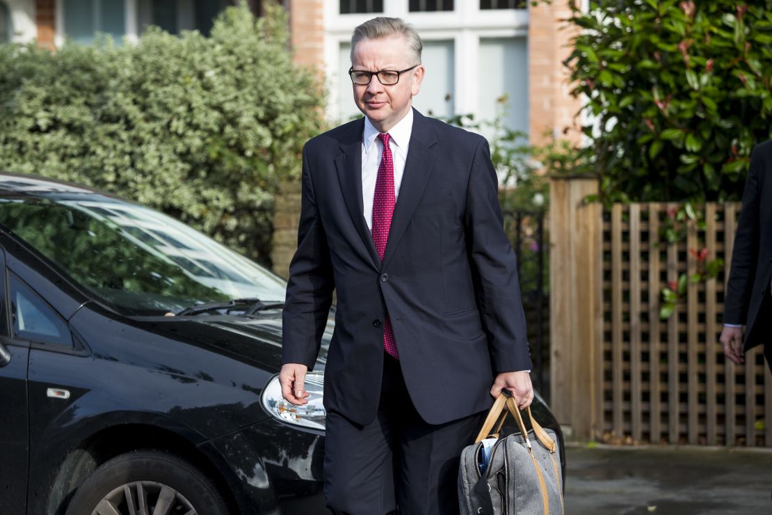 British Justice Secretary Michael Gove leaves his home in London ahead of announcing his leadership bid.