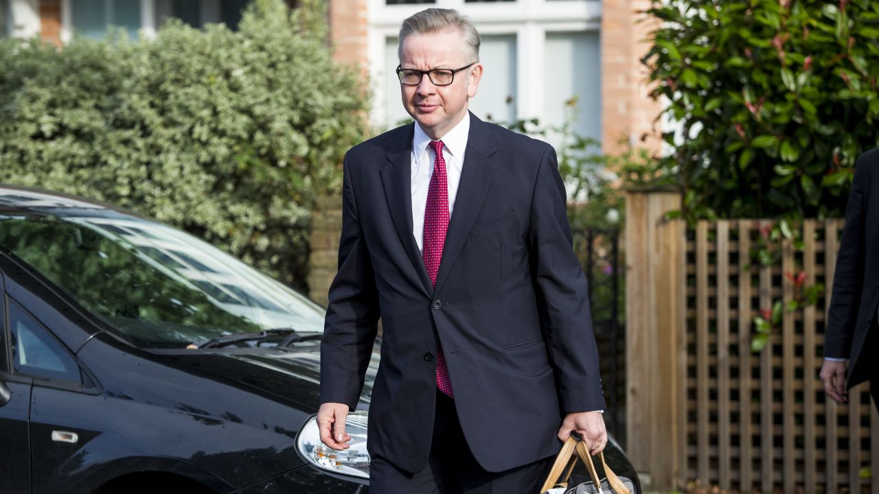 British Justice Secretary Michael Gove leaves his home in London ahead of announcing his leadership bid.
