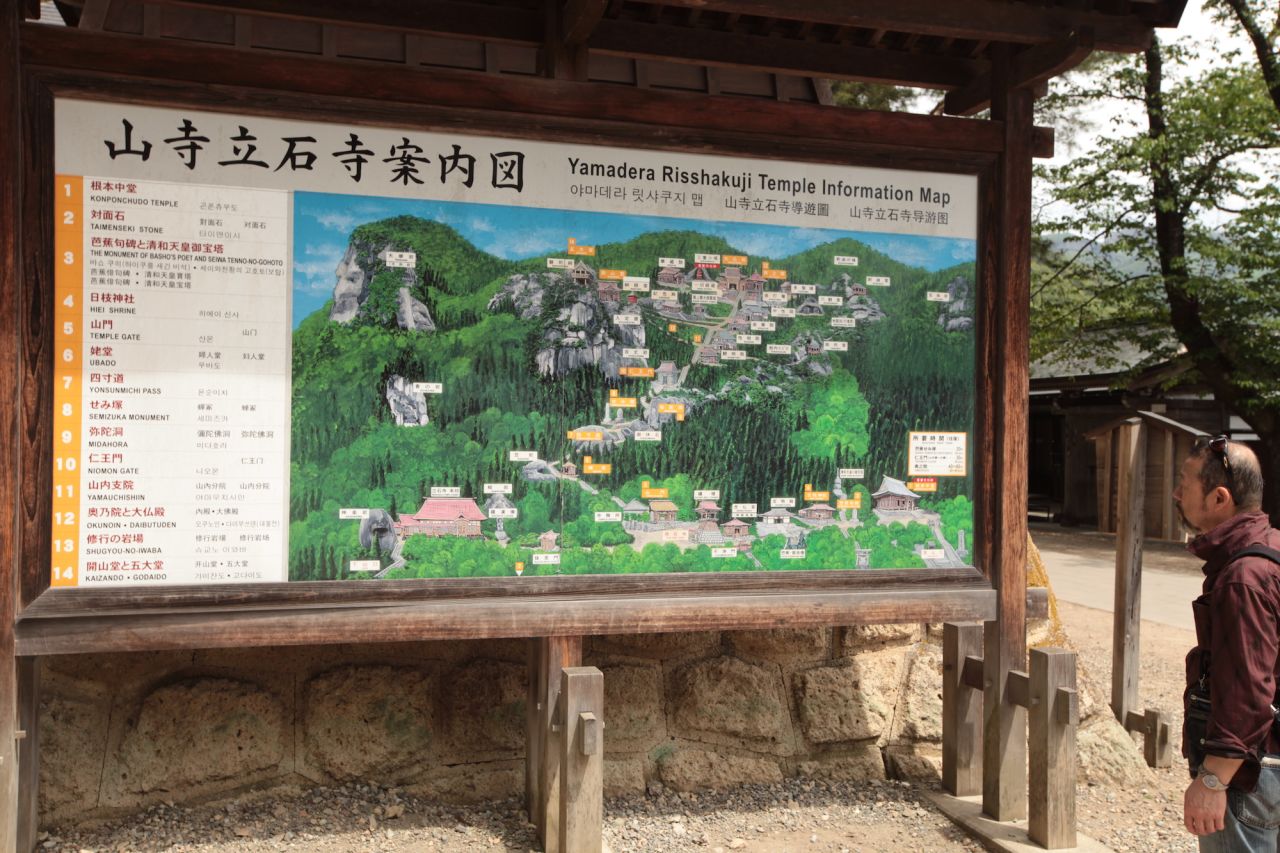 A map close to the temple entrance includes English information for visitors. 