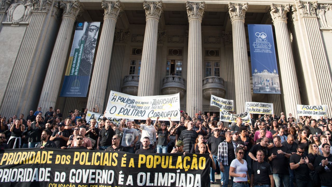 Police demonstrate against the government for arrears in their salary payments on June 27, 2016 in Rio de Janeiro, Brazil.