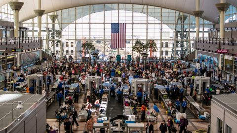 The TSA security lines crowded with vacation travelers in Denver, Colorado.