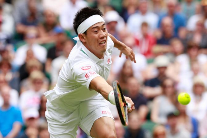 Kei Nishikori was first up on Centre Court against France's Julien Benneteau and despite losing the first set the Japanese won in four to reach the third round for the fourth time.  