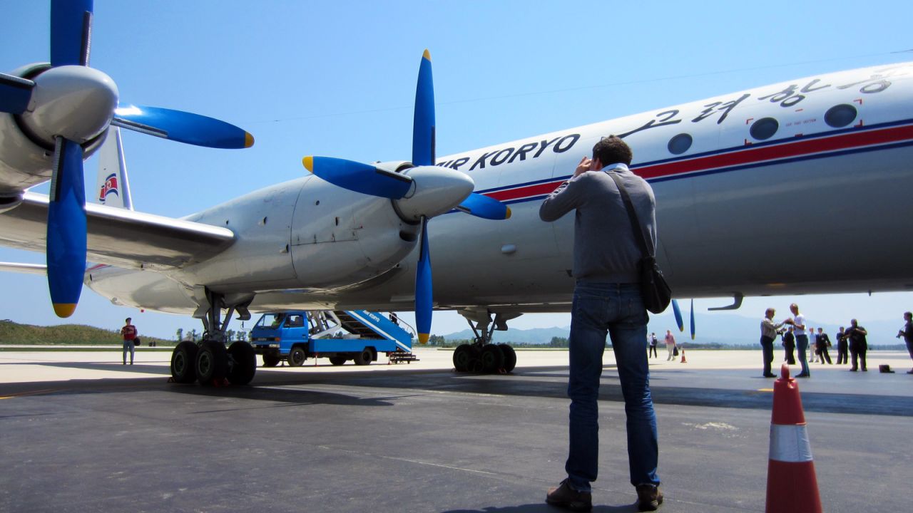 The group broke out in applause when the airport bus dropped us off in front of the majestic Ilyushin Il-18.