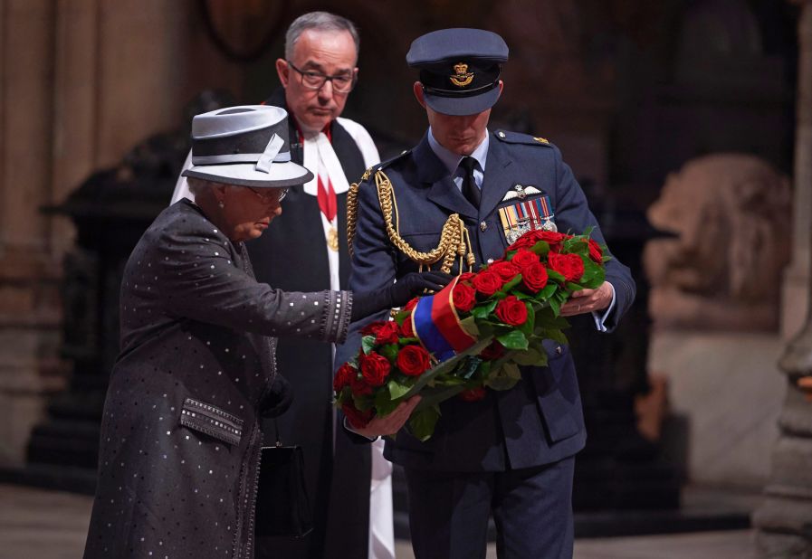 Britain's Queen Elizabeth II lays a wreath of roses and bay leaves on the Grave of the Unknown Warrior during the commemoration service on the eve of the centenary of the Battle of the Somme at Westminster Abbey in London, on the evening of June 30. The overnight vigil is the first to be held in the Abbey since peace vigils for the Cuban Missile Crisis over 50 years ago. The vigil is part of a program of centenary events being held in Scotland, Wales and Northern Ireland, and at Thiepval in northern France.