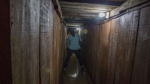 A journalist walks along a tunnel through which Guzman tried to escape.